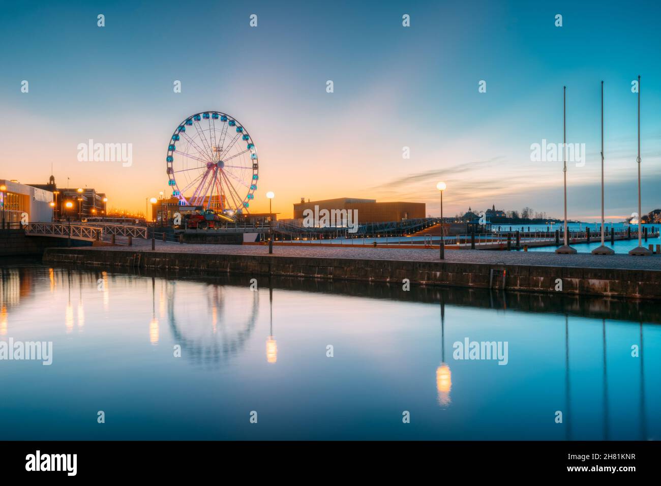 Helsinki, Finland. View Of Embankment With Ferris Wheel In Sunrise Morning Stock Photo