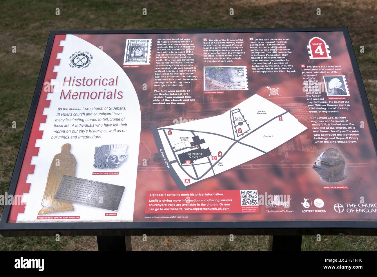 Tourist information board in the grounds of St Peter's Church detailing parts of it's history, St Albans, Hertfordshire, UK. Stock Photo