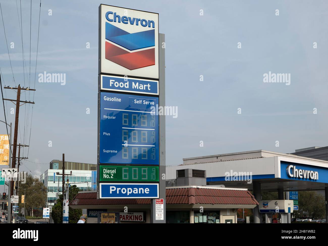 Los Angeles, CA USA - November 19, 2021: Staggering gas prices at over six dollars per gallon at a Chevron station in Los Angeles Stock Photo
