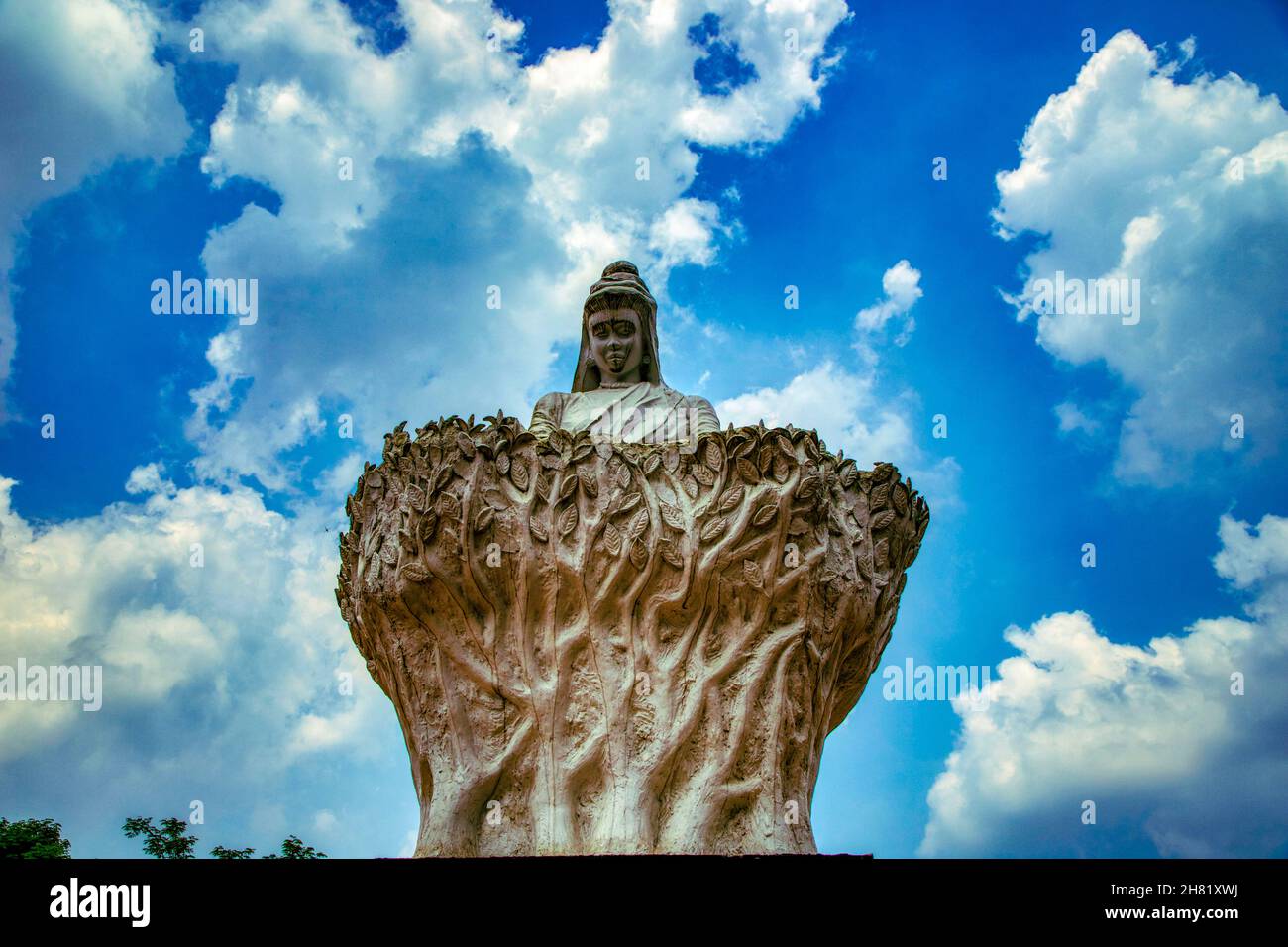 Statue of a female tea plucker at the entrance Moulvibazar district of Bangladesh. Stock Photo