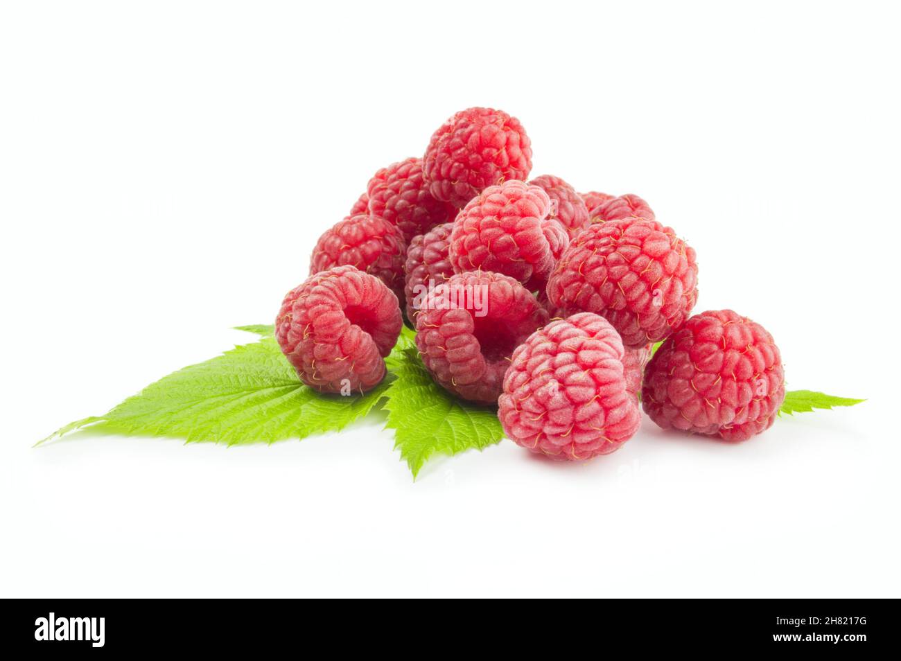 Fresh raspberry on white background Stock Photo - Alamy