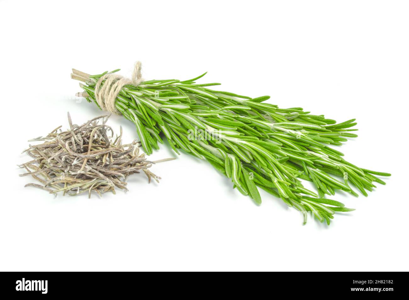 Bunch of fresh and pile dried rosemary on a white background Stock ...