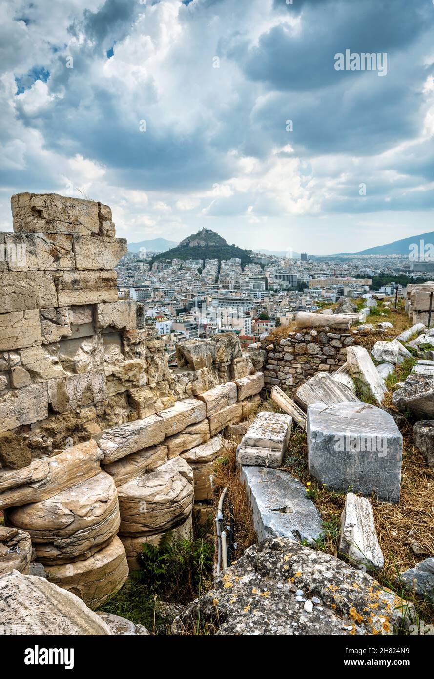 Ancient Greek ruins on Acropolis top, Athens, Greece. Dramatic view of