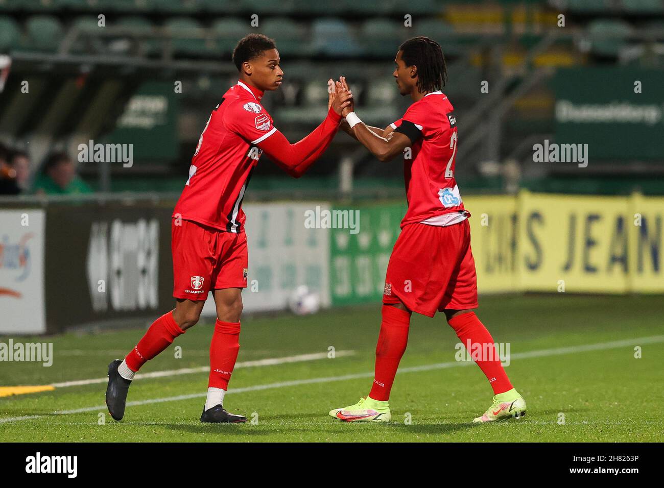 DEN HAAG, NETHERLANDS - NOVEMBER 26: Jerailly Wielzen of FC Dordrecht,  Jacky Donkor of FC Dordrecht during the Dutch Keukenkampioendivisie match  between ADO Den Haag and FC Dordrecht at Cars Jeans Stadion