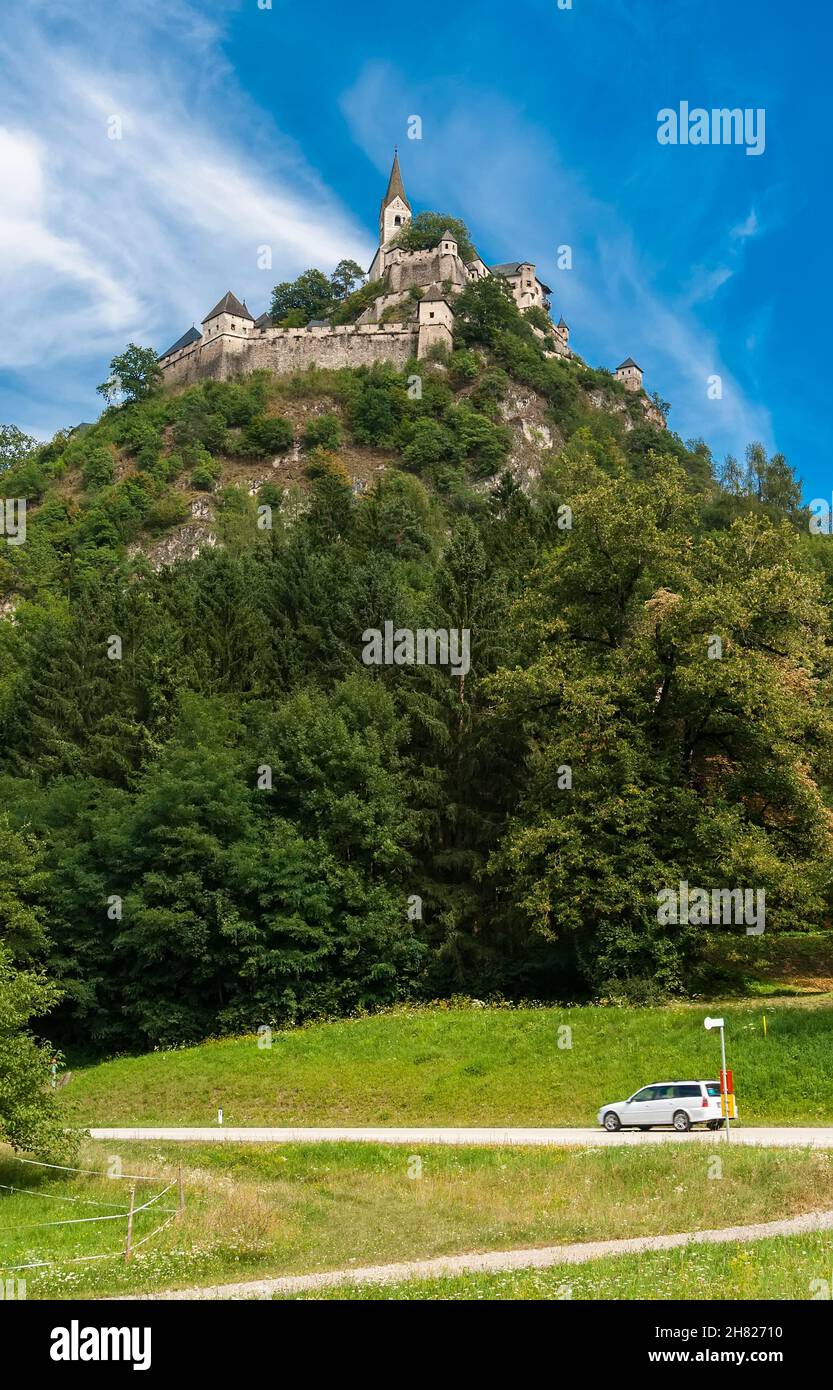 A medieval castle on top of a wooded hill - Hochosterwitz Castle. Austria Stock Photo