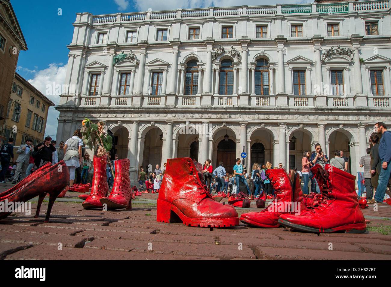 Bergamo Italy 10 May 2013: art installation in Old Town Square against violence to women Stock Photo