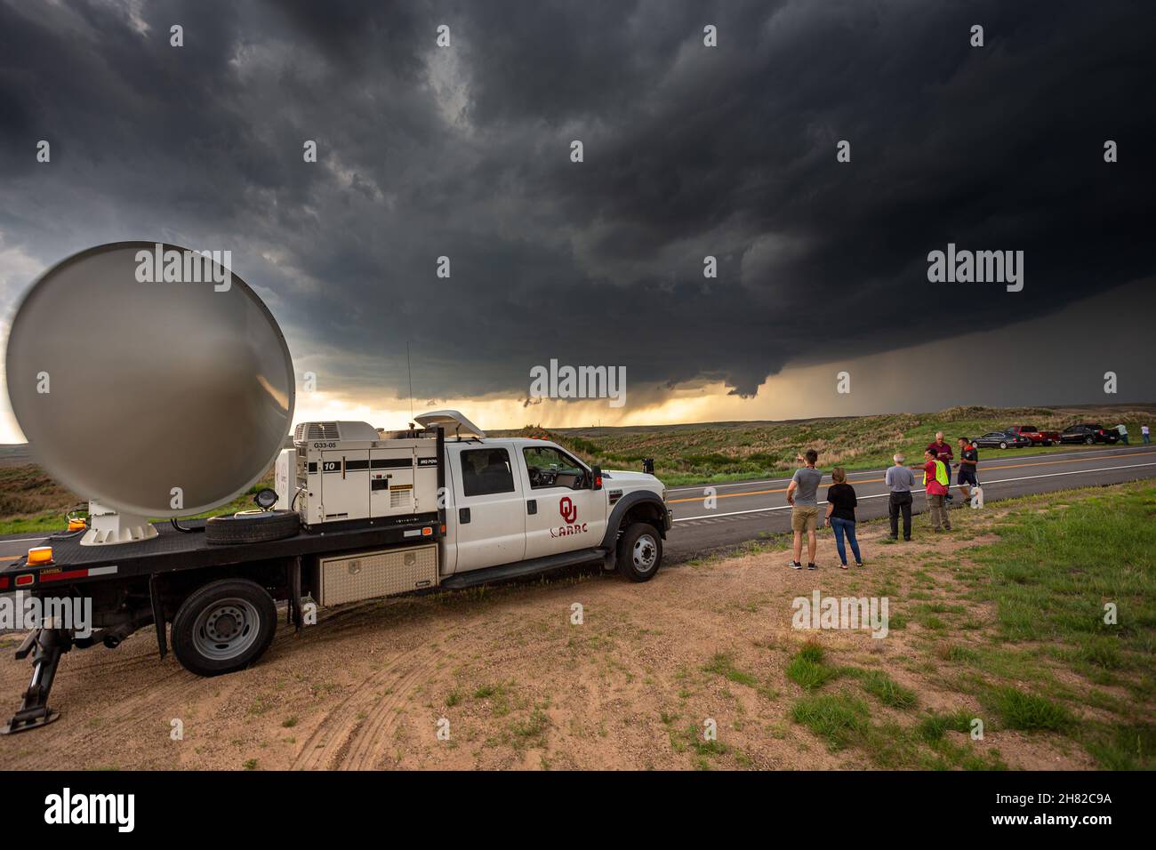 Researchers from the University of Oklahoma scan a supercell storm with a mobile radar unit near Freedom, Oklahoma, May 29, 2018. Stock Photo