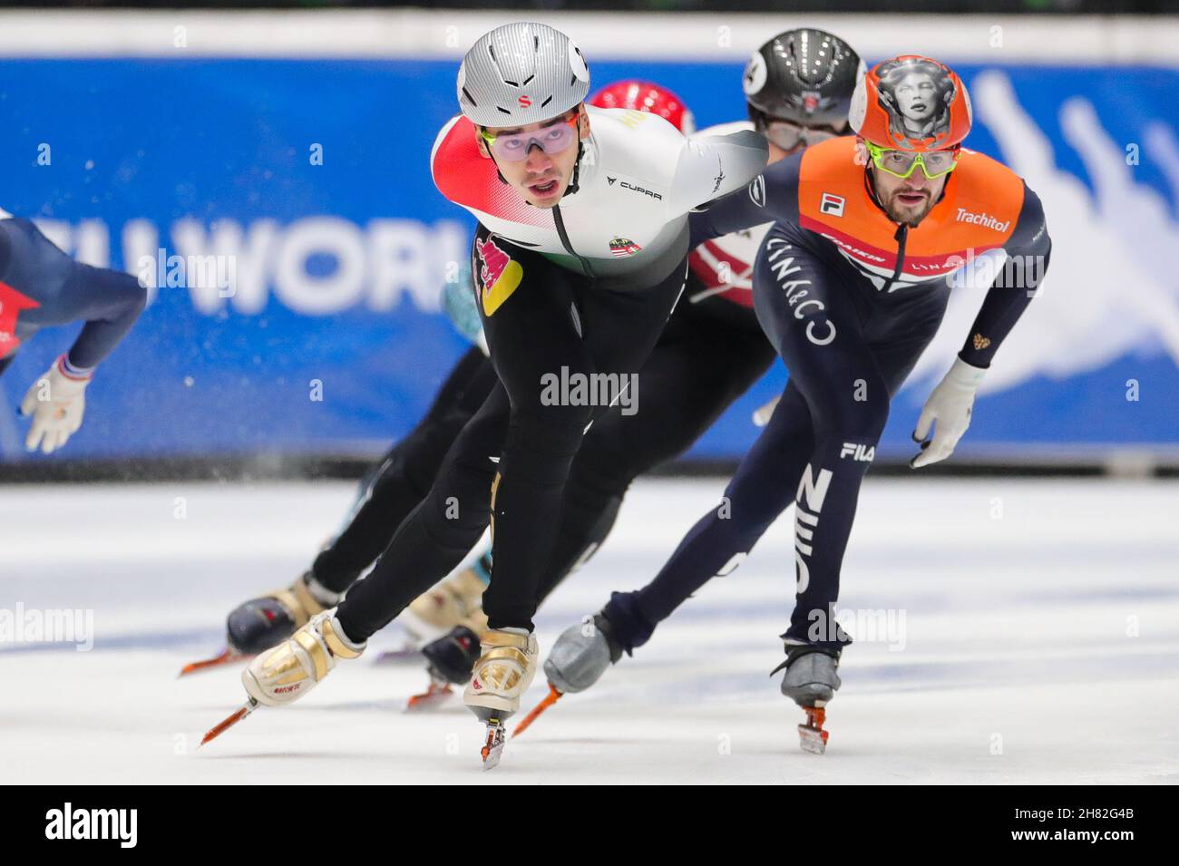 Dordrecht, Netherlands. 26th Nov, 2021. Liu Shaolin Sandor (front) of Hungary competes during the men's 1000m heat of the ISU World Cup Short Track Speed Skating series in Dordrecht, the Netherlands, Nov. 26, 2021. Credit: Zheng Huansong/Xinhua/Alamy Live News Stock Photo