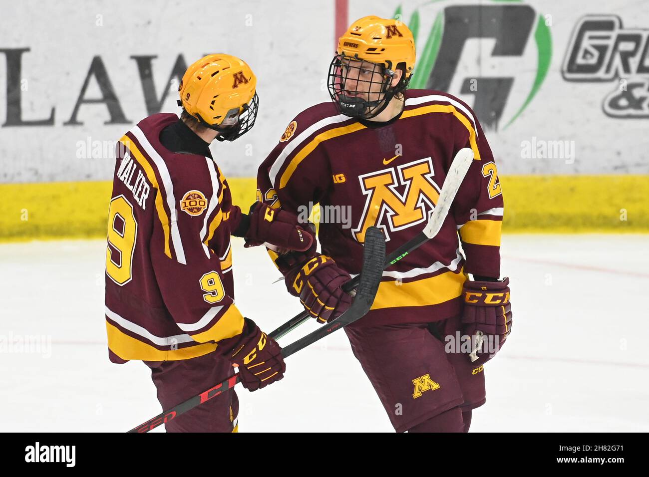 North Dakota, USA. 26th Nov, 2021. November 26, 2021 Minnesota Gophers forward Bryce Brodzinski (22) is congratulated by Minnesota Gophers forward Sammy Walker (9) after scoring a goal during a NCAA men's hockey game between the Minnesota Gophers and the University of North Dakota Fighting Hawks at Ralph Engelstad Arena in Grand Forks, ND. By Russell Hons/CSM Credit: Cal Sport Media/Alamy Live News Stock Photo