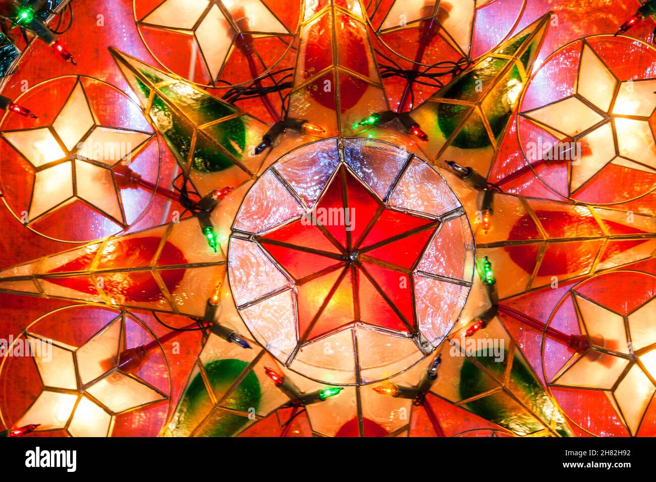 Multi-colored 'parol,' Filipino traditional Christmas lanterns and lighted  at a roadside shop in Manila, Philippines Stock Photo - Alamy