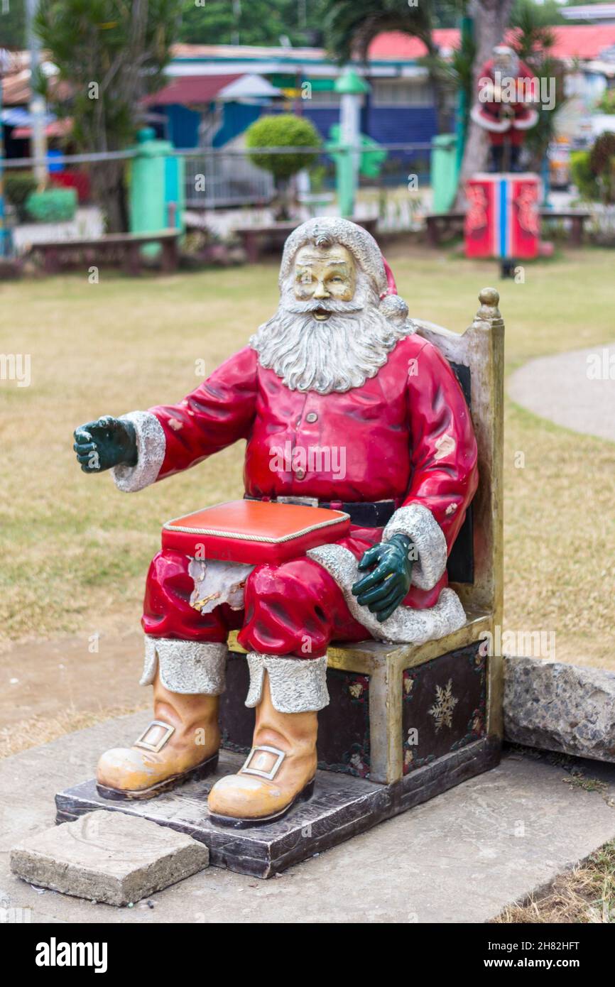 Santa Claus statue during Christmas in Quezon, Philippines Stock Photo