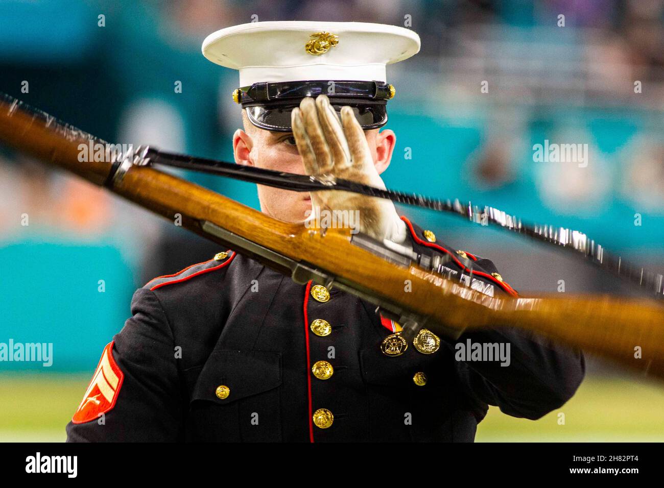 Miami, Florida, USA. 11th Nov, 2021. Corporal Landon Johnson, rifleman, Silent Drill Platoon, performs during a halftime show at Hard Rock Stadium in Miami, Nov. 11, 2021. During the month of November, the National Football League honors the military with Salute to Service games; the Silent Drill Platoon performed this week at the Miami Dolphins' game against the Baltimore Ravens. Credit: U.S. Marines/ZUMA Press Wire Service/ZUMAPRESS.com/Alamy Live News Stock Photo