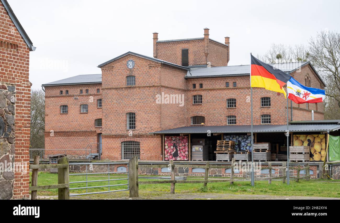 Zinzow, Germany. 26th Nov, 2021. The factory building of the company Gutsbrennerei Schloss Zinzow. Brandies, spirits and liqueurs are produced at the Schloss Zinzow estate distillery. With an Instagram post, US pop star Pink has caused sales of a small distillery near Anklam to skyrocket. She said the distillery normally produces about 800 litres of the herbal liqueur a year, which is bottled and distributed by a Berlin-based marketing group. For this year, the company expects about three times that amount.(to dpa Singer Pink makes herbal liqueur from Weste Credit: dpa/Alamy Live News Stock Photo