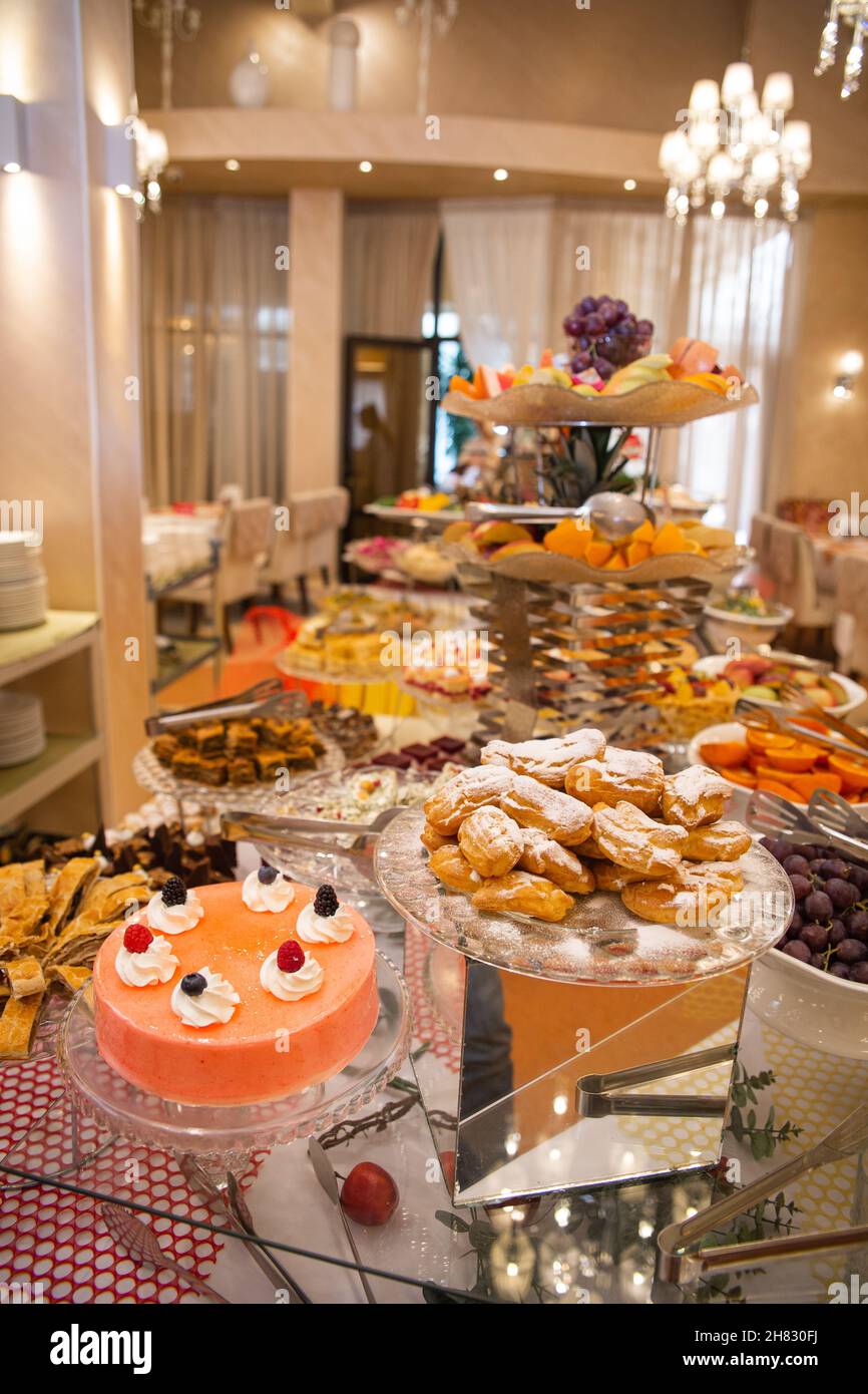 fruits and desserts in the buffet restaurant Stock Photo Alamy