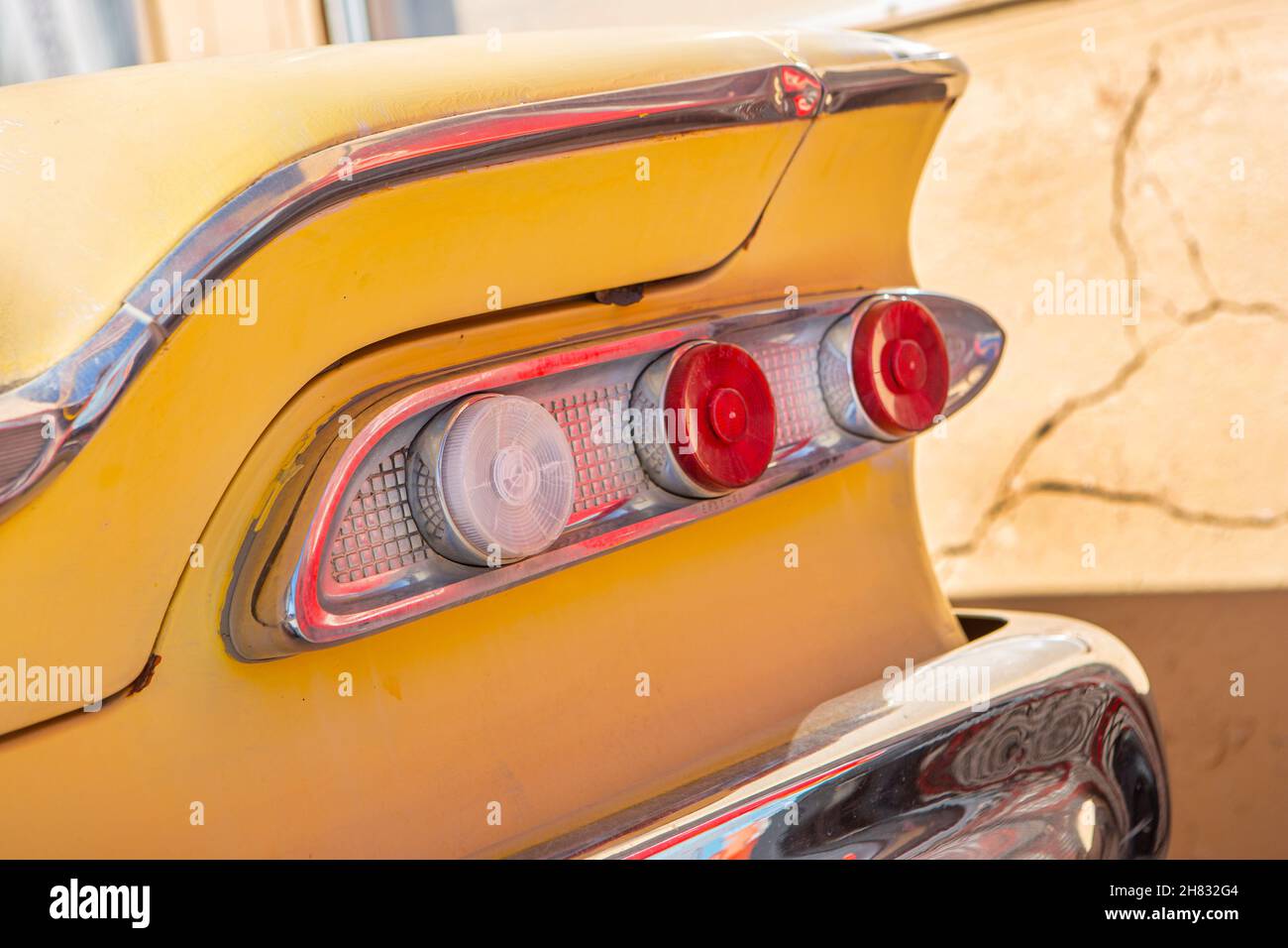 The rear light cluster on a classic yellow Ford Edsel Stock Photo