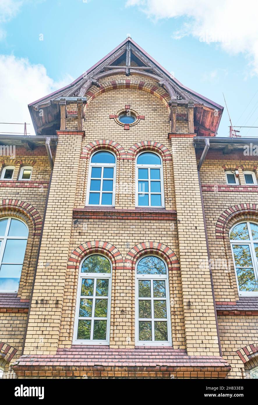 Building built in late 19th century of yellow clinker brick. Kaliningrad, Russia Stock Photo