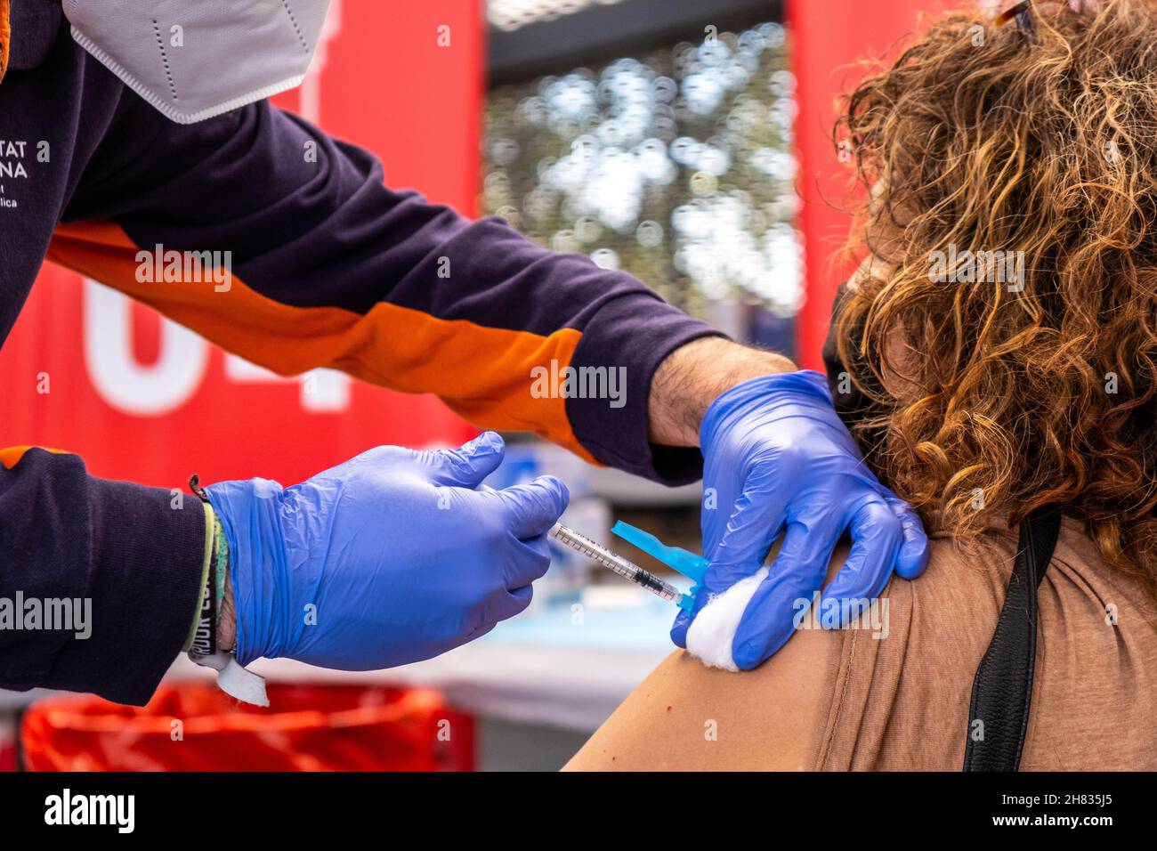 Valencia, Spain; 6th april 2021: Healthcare professional injects the anticovid vaccine to a patient at a Vaccination Center. Anti-covid vaccination ca Stock Photo