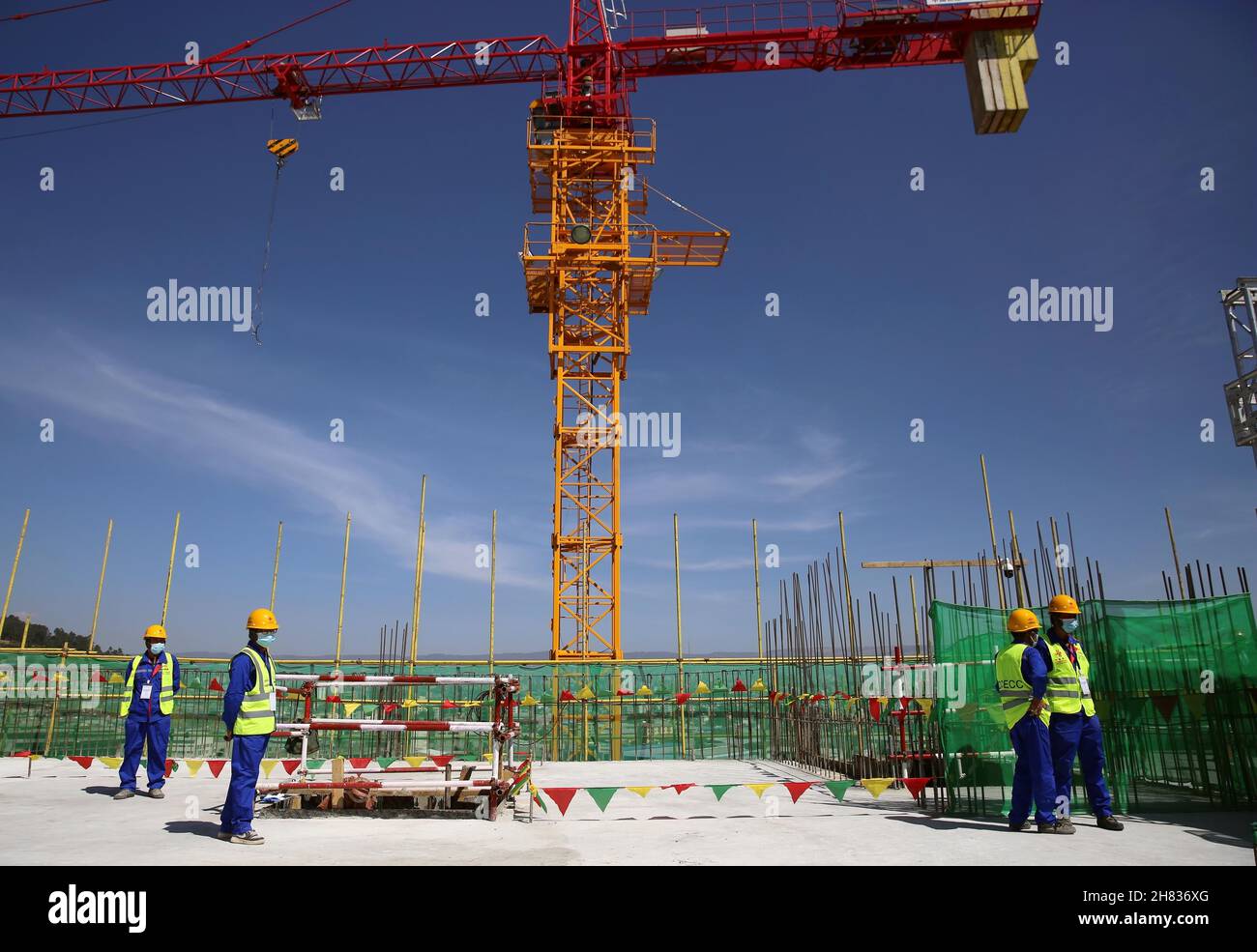 Addis Ababa, Ethiopia. 26th Nov, 2021. Photo taken on Nov. 26, 2021 shows the construction site of the Headquarters Building Phase I Project of the Africa Centers for Disease Control and Prevention (Africa CDC) in Addis Ababa, Ethiopia. The African Union (AU) Commission on Friday marked structural completion of the main building of the China-aided future headquarters of the Africa CDC.TO GO WITH 'Roundup: AU marks milestone in construction of China-aided landmark project for disease control, prevention' Credit: Wang Ping/Xinhua/Alamy Live News Stock Photo