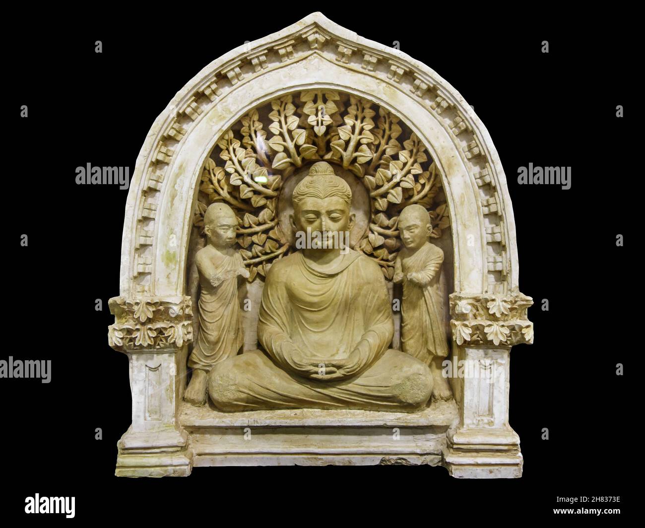 Buddha and attendants, sculptural composition of the 3-4 century. Discovered during excavations of a Buddhist temple in Central Asia in South Uzbekist Stock Photo