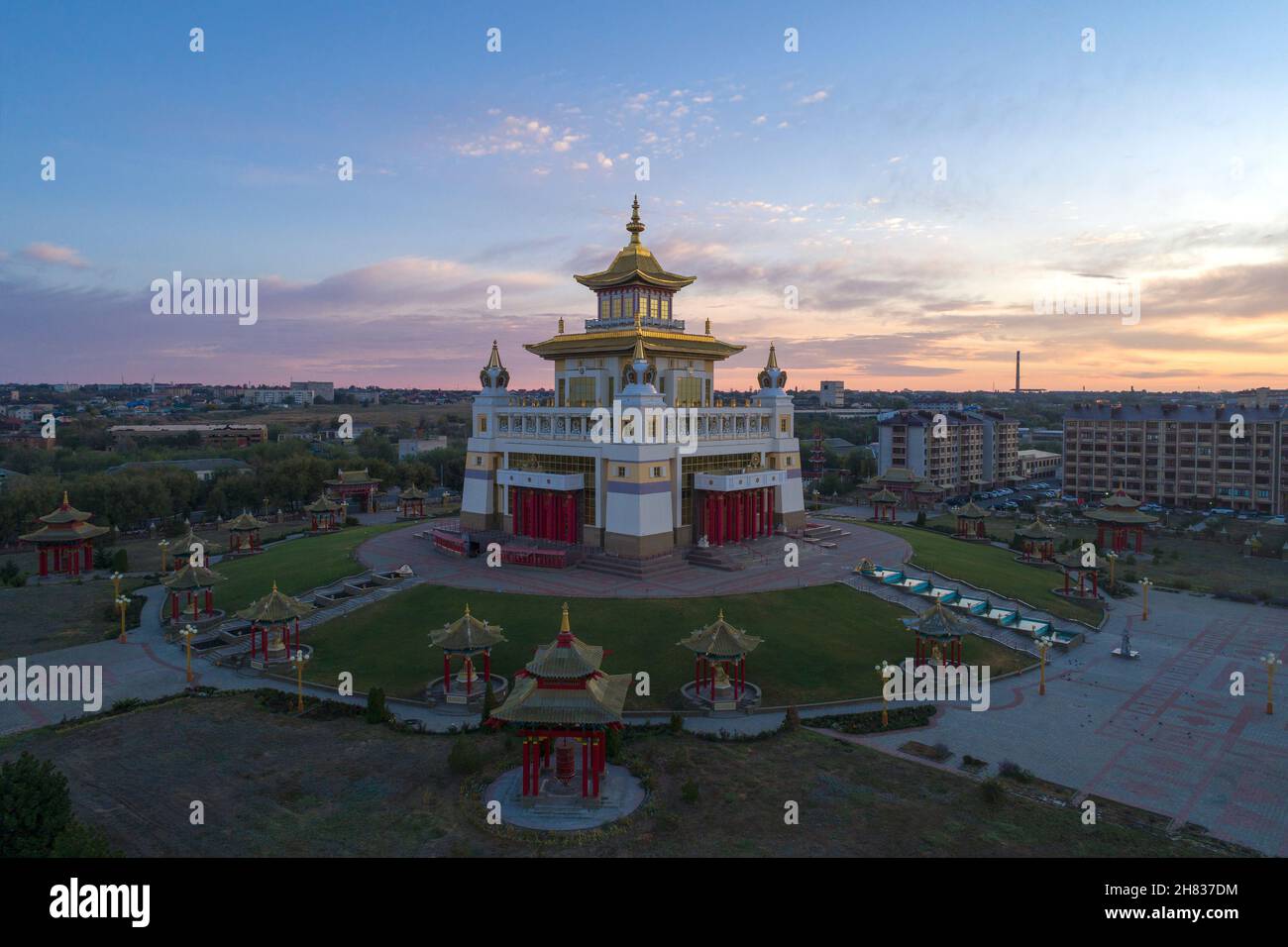 Buddhist Temple of 'Golden Abode of Buddha Shakyamuni' at dawn in the early morning (aerial photography). Elista, Russia Stock Photo