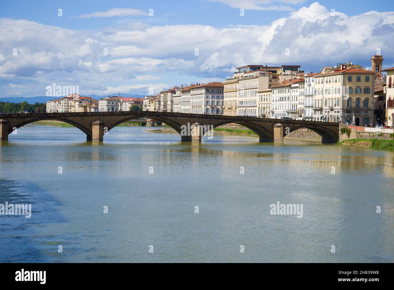 Ponte alla Carraia and the city embankment on a sunny day. Florence, Italy Stock Photo