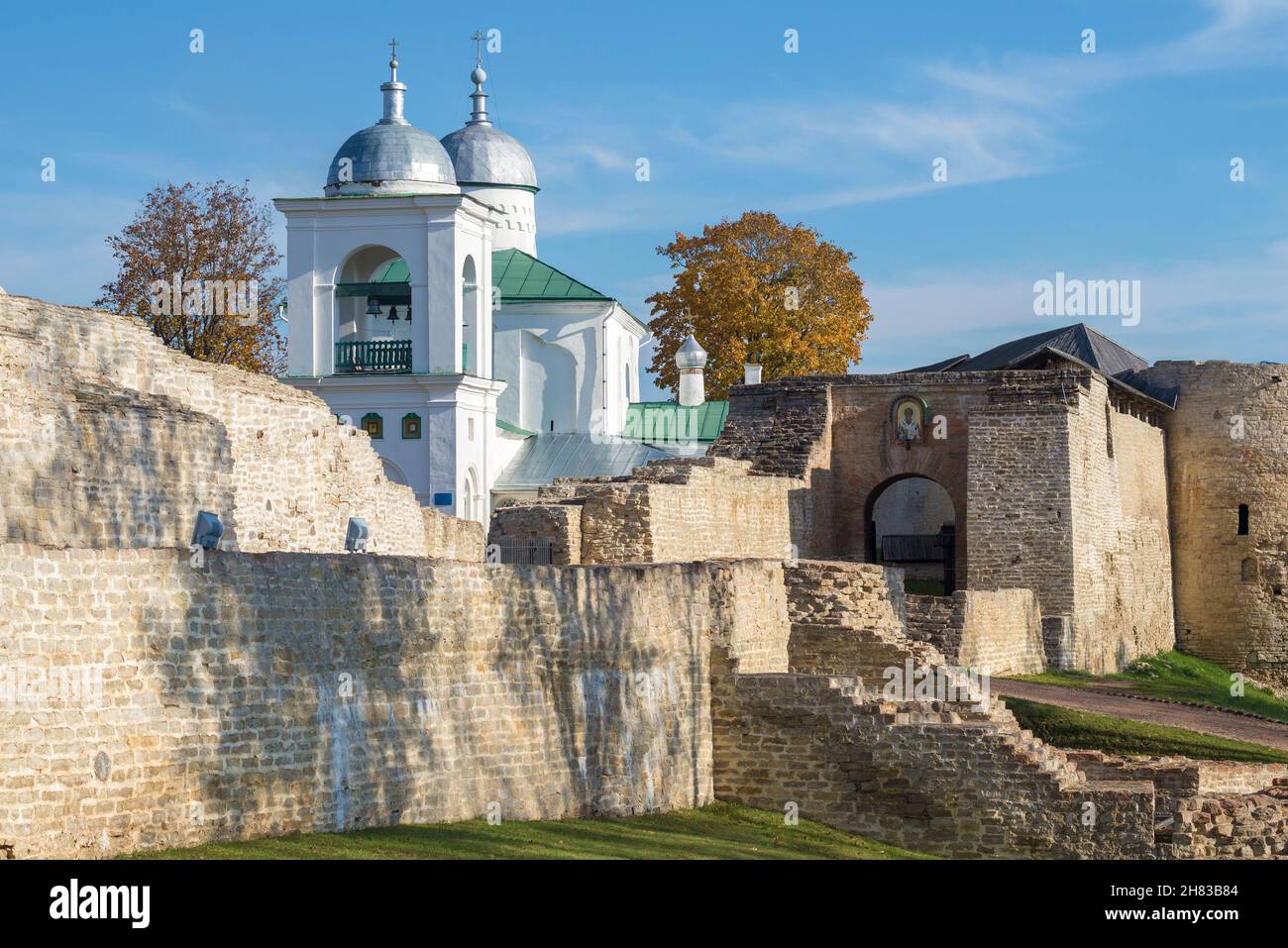 St. Nicholas Cathedral on the ruins of the ancient Izborsk fortress on a sunny October day. Pskov region, Russia Stock Photo