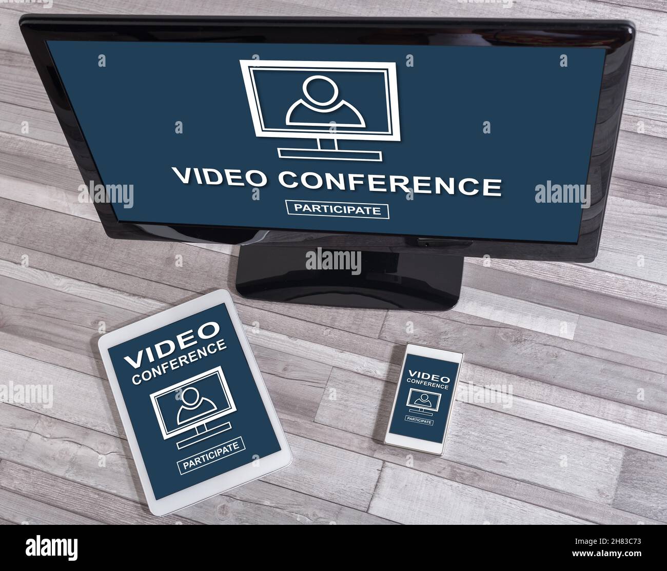 Video conference concept shown on different information technology devices Stock Photo