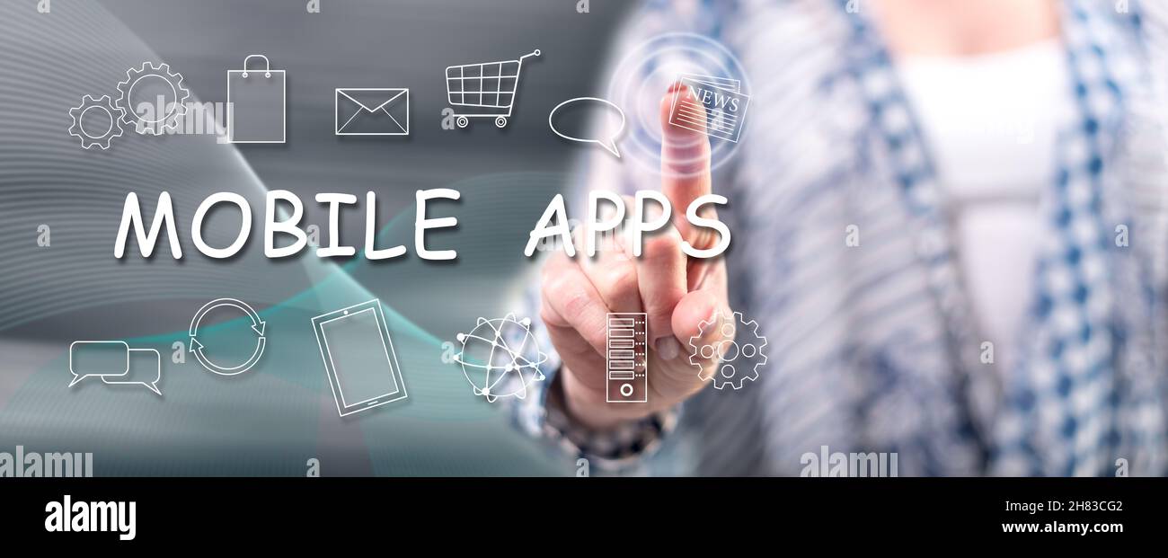 Woman touching a mobile apps concept on a touch screen with her finger ...