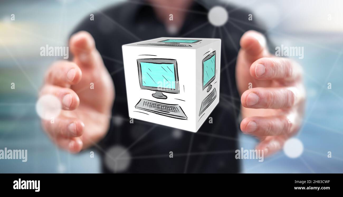 Computer concept between hands of a man in background Stock Photo - Alamy
