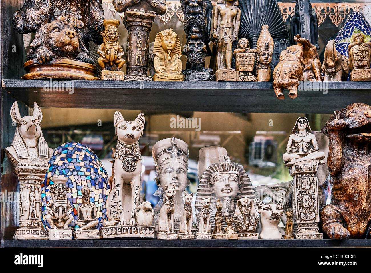 Egyptian figurines depicting gods, pharaohs, animal figurines as