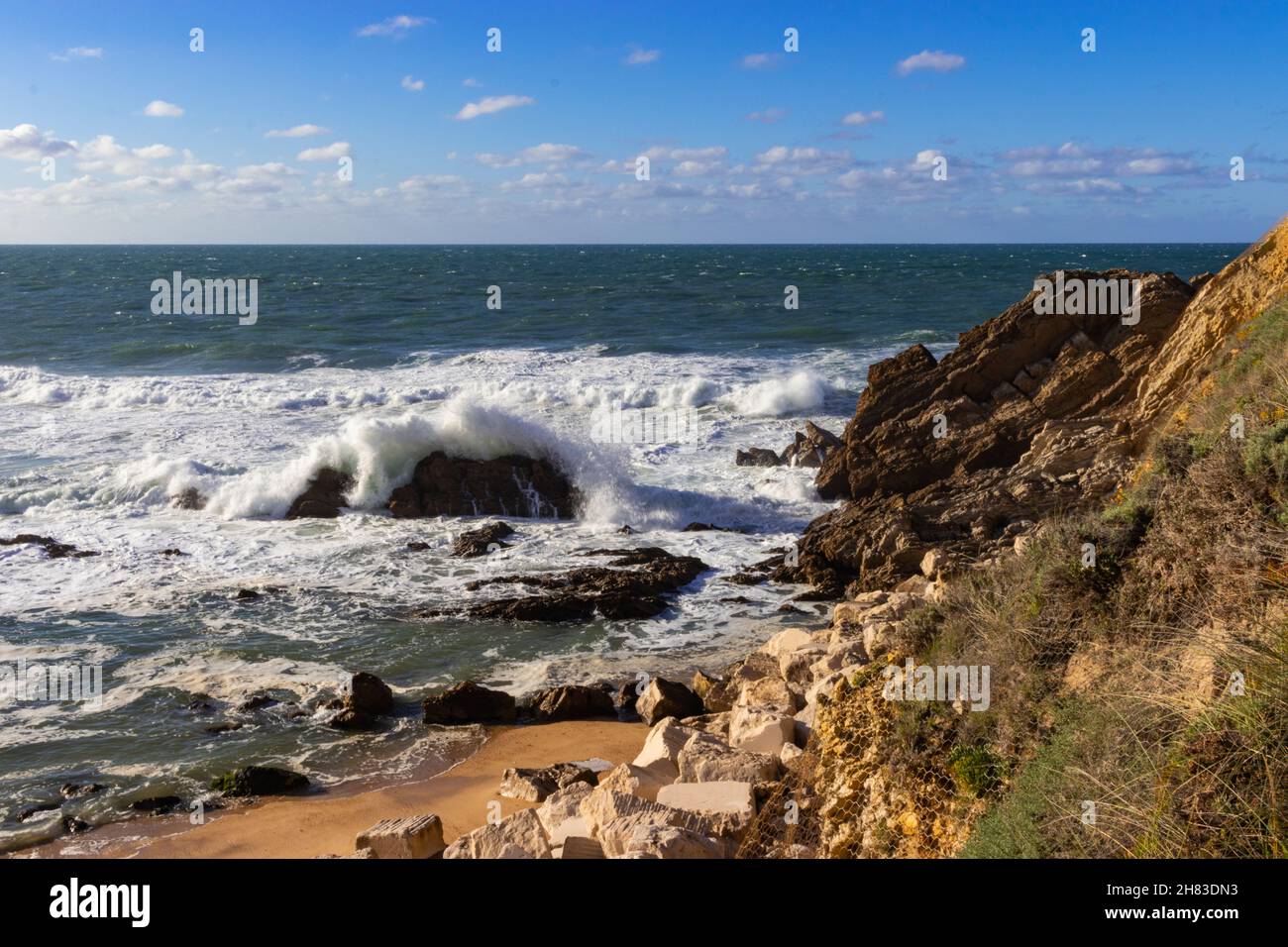Waves Crashing Over a Rock Stock Photo