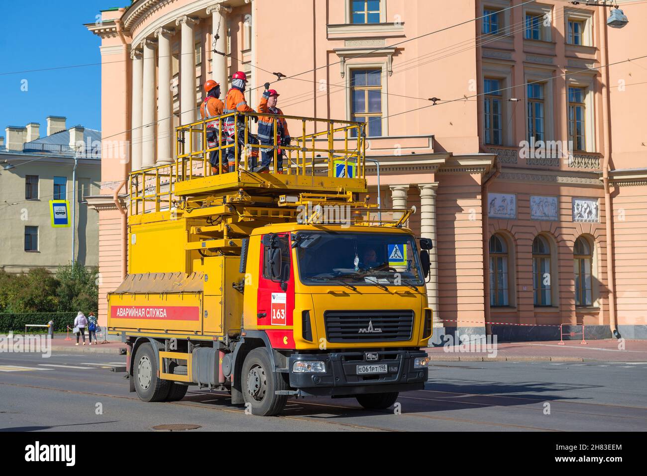 SAINT PETERSBURG, RUSSIA - SEPTEMBER 05, 202: A team of workers on the car of the city electric transport emergency service Stock Photo