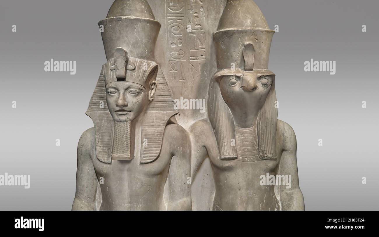 Ancient Egyptian statue of pharaoh Horemheb with Horus, 1319 - 1292 BC, 18th Dynasty.  Kunsthistorisches Muesum Vienna inv AS 8301. Limestone height 1 Stock Photo