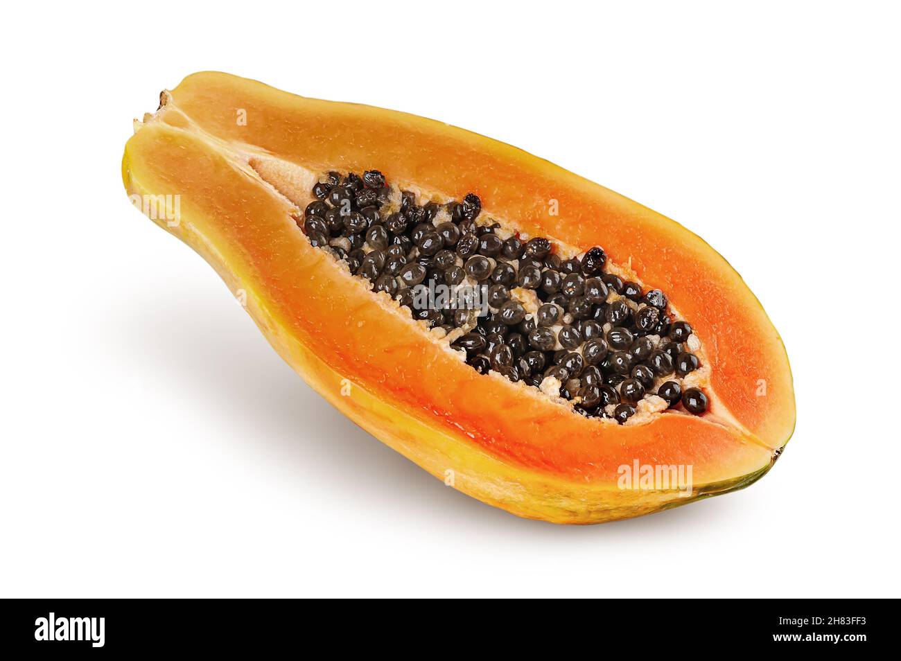 Single half ripe papaya rotated isolated on white background Stock Photo