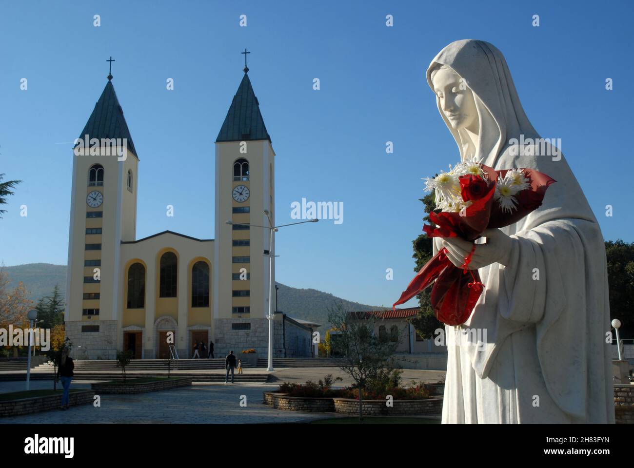 Statue of Virgin Mary, Queen of Peace, in front of Medjugorje Catholic Church, Medjugorje, Bosnia and Herzegovina. Stock Photo