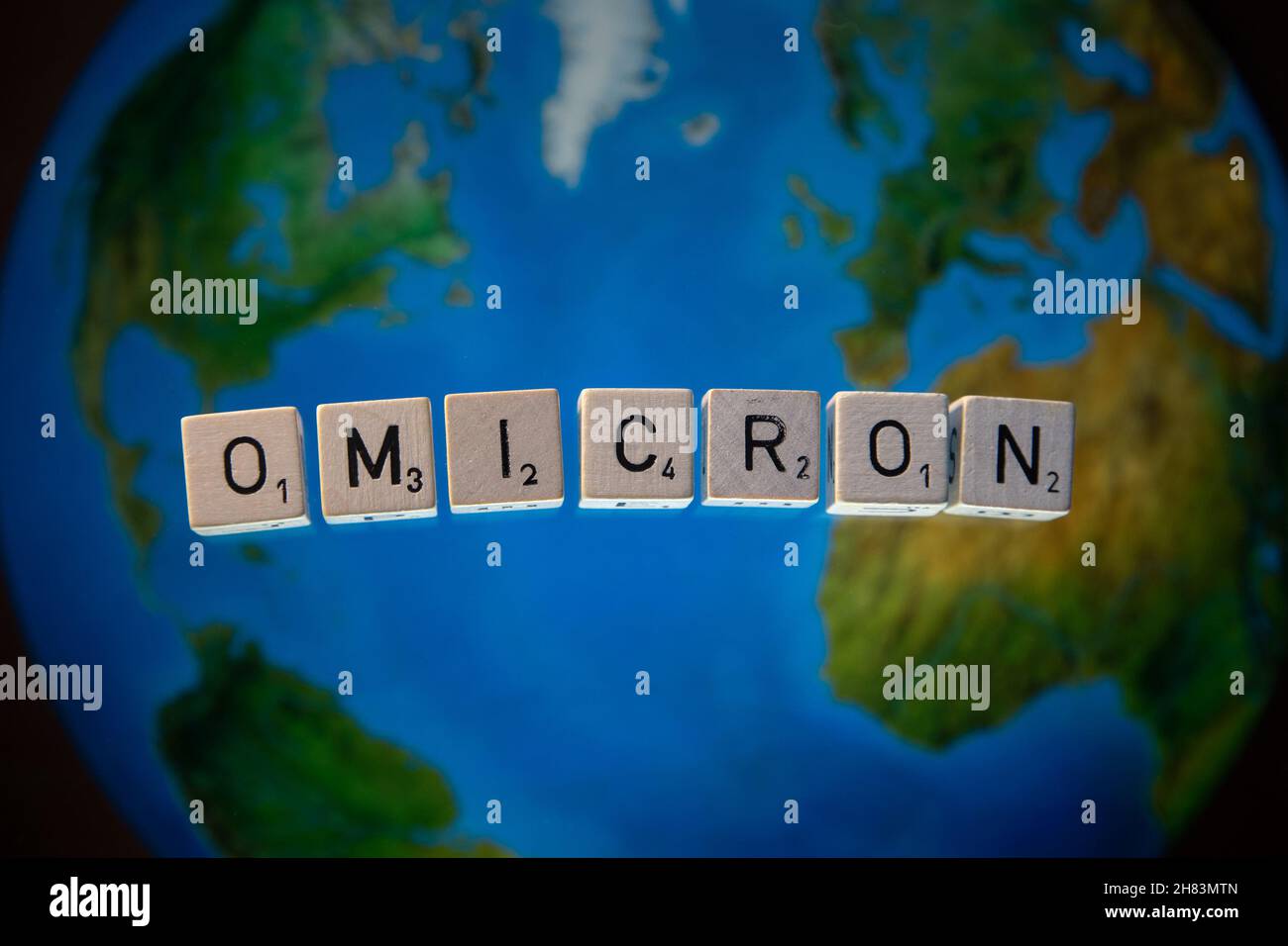 Omicron  Letters spelling out Omicron, The name the WHO has given to a new variant of Covid-19  Countries around the world are introducing new travel Stock Photo