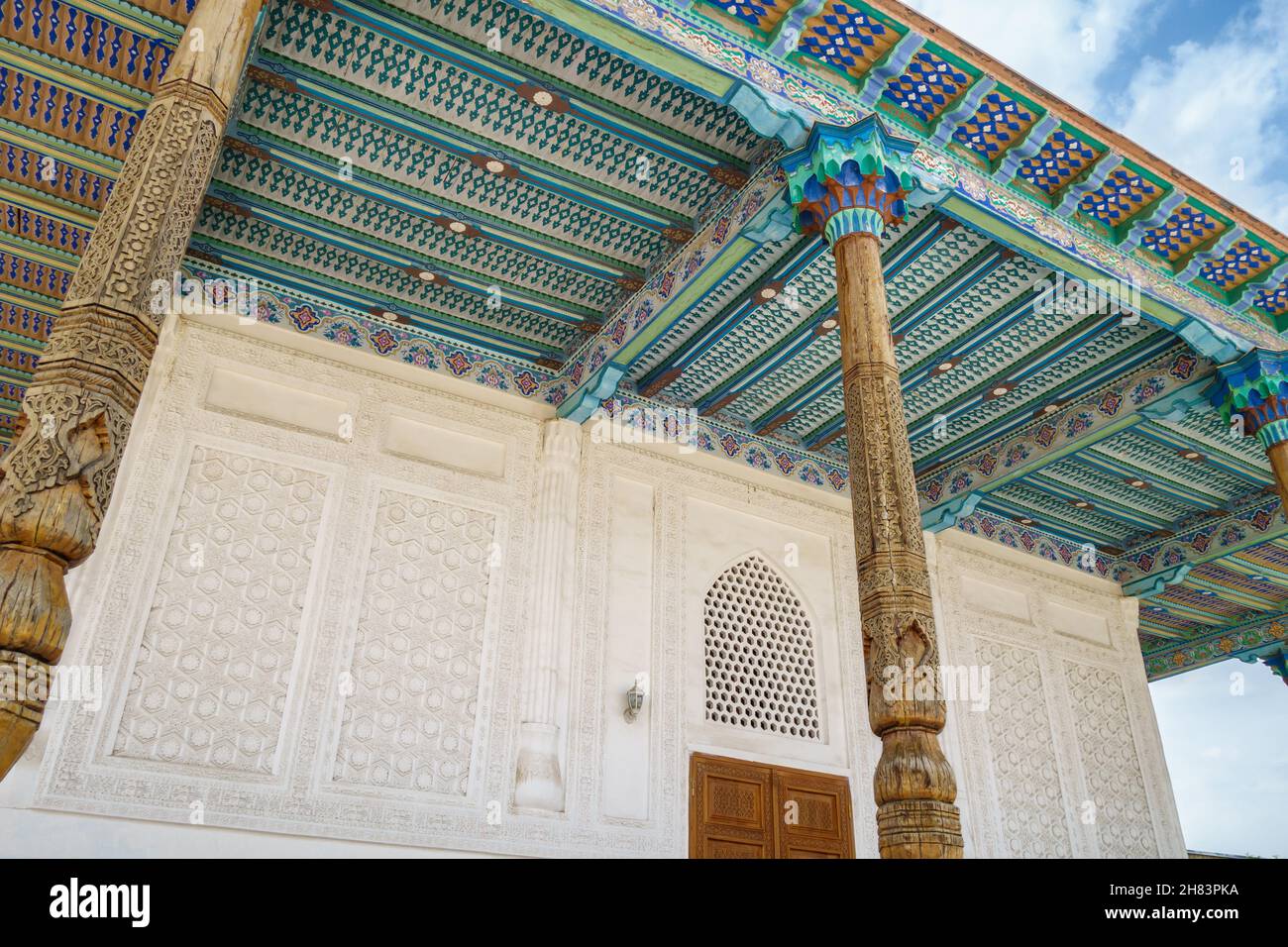 Facade of madrasah with traditional oriental decorations. Madrasah Abdyshukur Agalik, Shakhrisabz, Uzbekistan Stock Photo