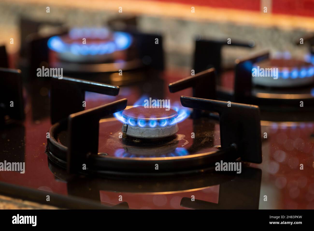 https://c8.alamy.com/comp/2H83PKW/the-gas-burns-in-the-burner-of-a-kitchen-stove-horizontal-view-2H83PKW.jpg