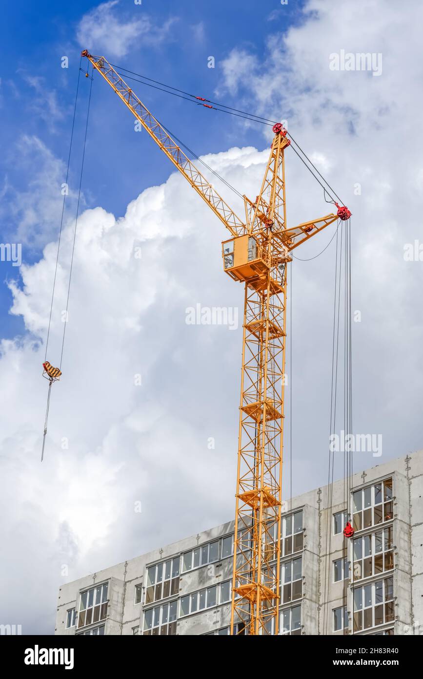 Building multi-storey houses and construction works Stock Photo