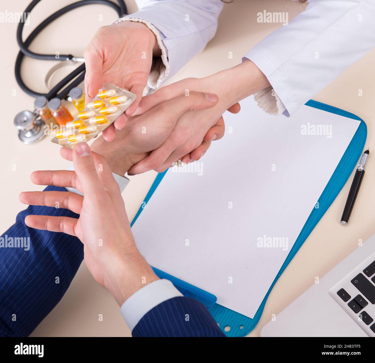 The man visiting doctor for routine check-up Stock Photo - Alamy
