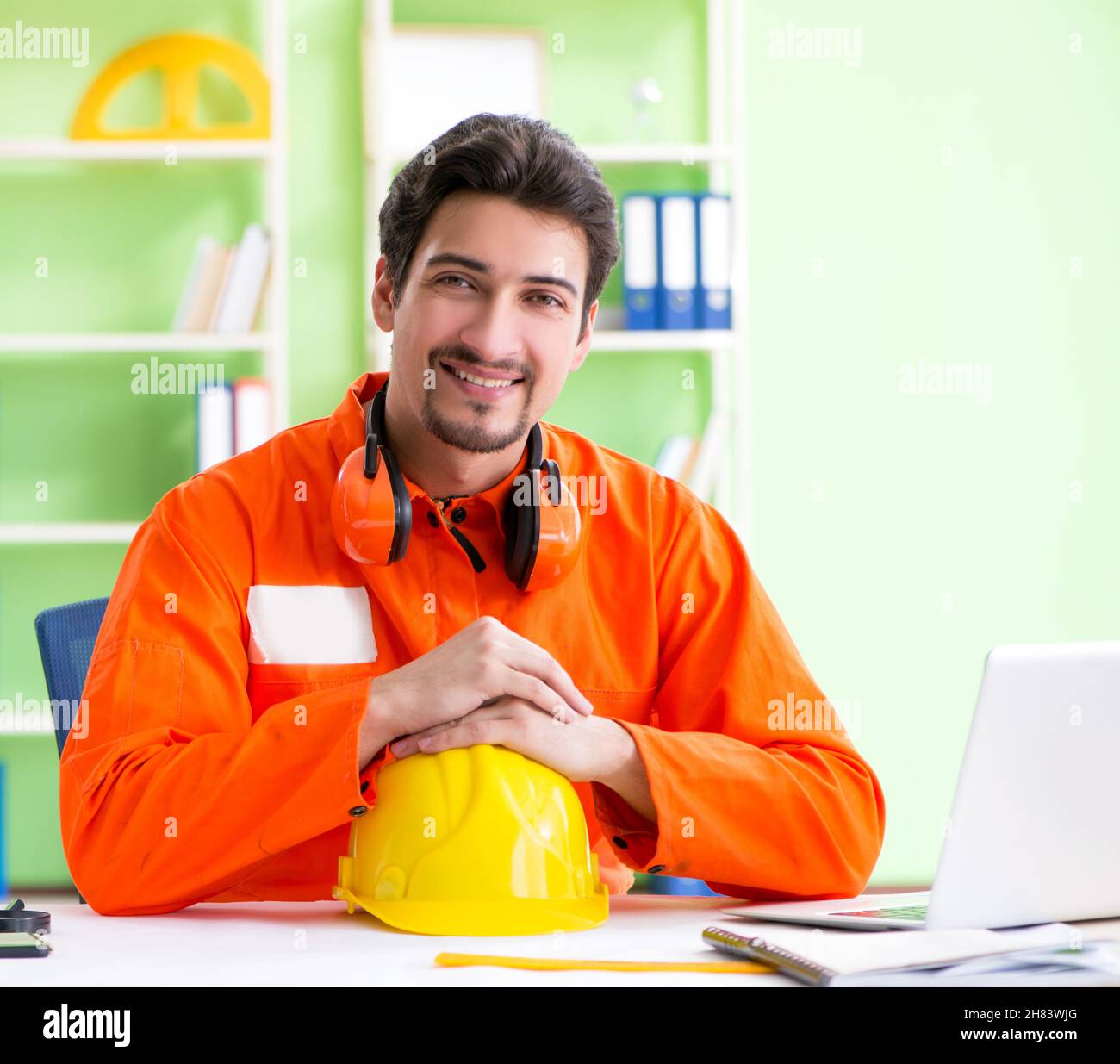 The construction supervisor planning new project in office Stock Photo