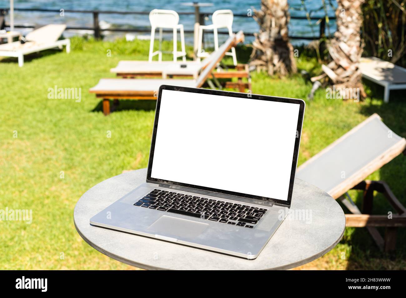 computer on table background as a pool Stock Photo - Alamy