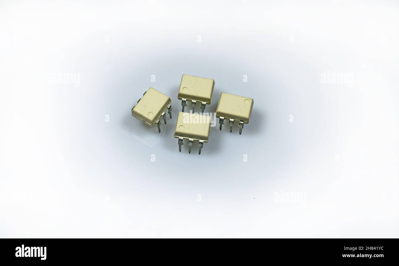 Electronic components. Optocouplers on white background. Stock Photo