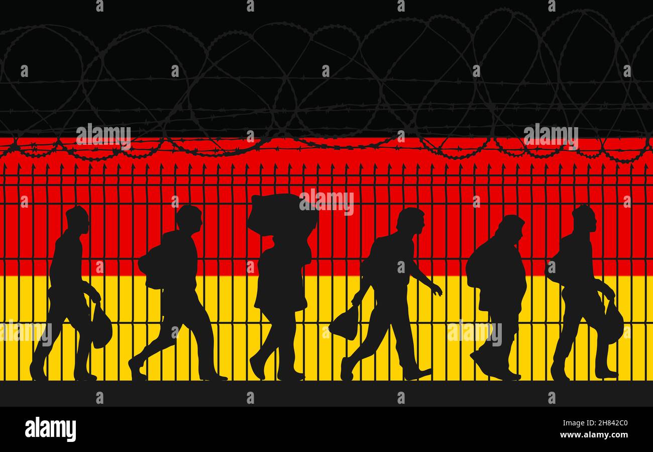 German flag. Refugees near barbed wire fence. Immigrants used as a political weapon for Hybrid Attack Stock Photo