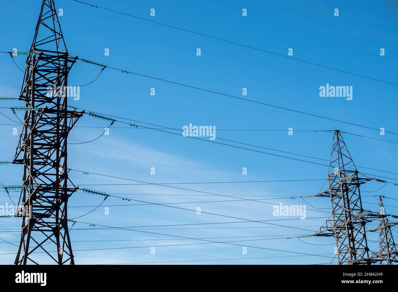 Electric tower and lines. Energy supply. High electricity prices. Stock Photo