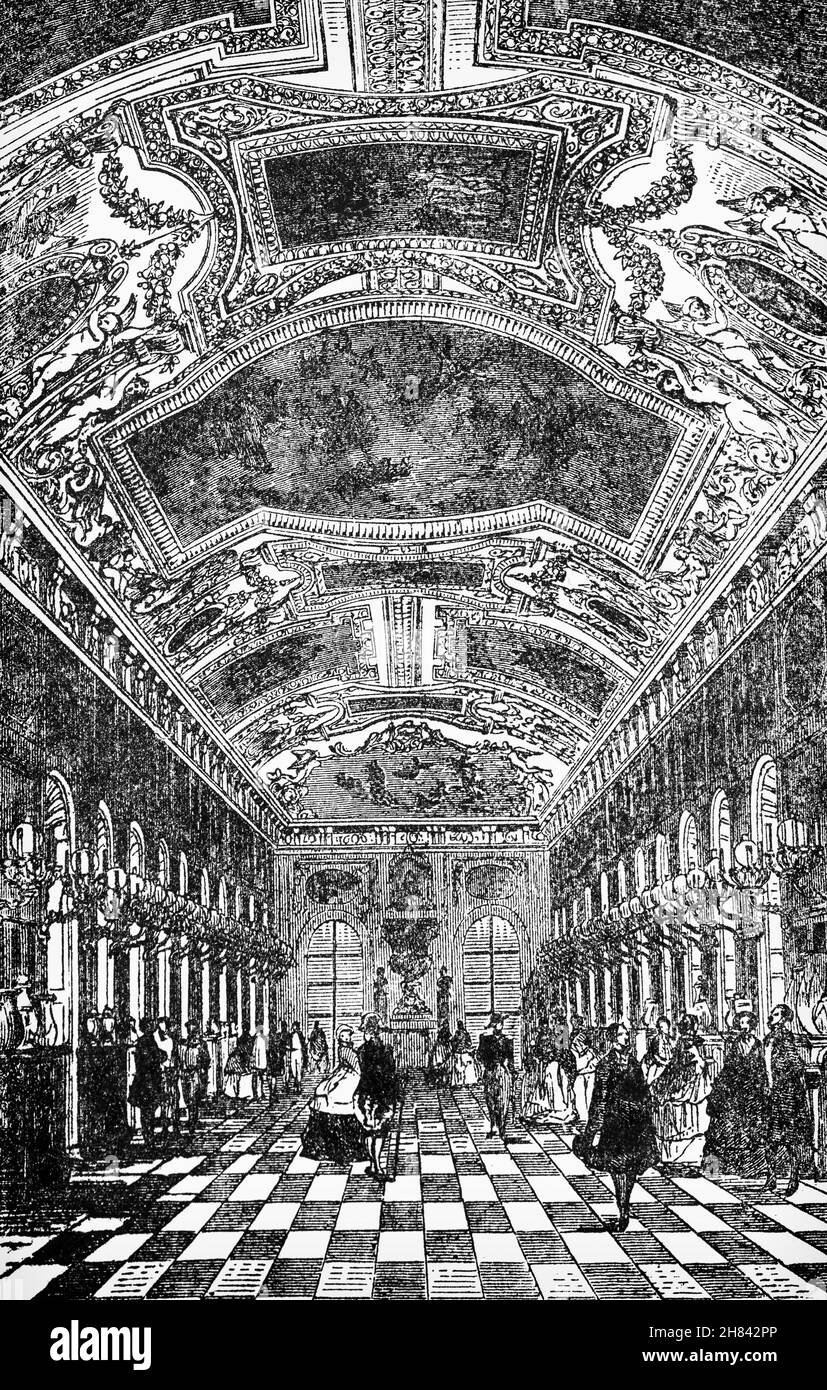 A late 19th Century illustration of the Galerie d'Apollon (Apollo Gallery) in the wing known as the Petite Galerie, in the Louvre Palace, Paris, France. After a fire destroyed an earlier gallery in 1661, Louis XIV ordered this part of the Louvre to be rebuilt.  Architectural work was entrusted to Louis Le Vau, while Charles Le Brun was assigned responsibility for decorations by Jean-Baptiste Colbert. Le Brun's main theme for the room revolved around the movement of the sun through time and space, with the figure of Apollo glorifying Louis as the sun king. Stock Photo