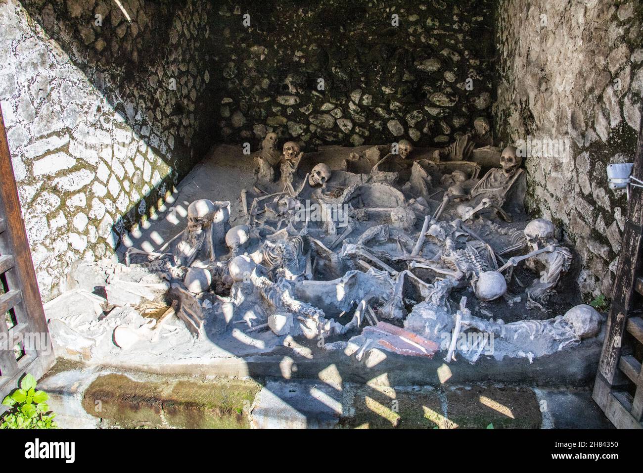 Skeletons in a boat shed, Roman ruins of Herculaneum, Naples, Italy Stock Photo