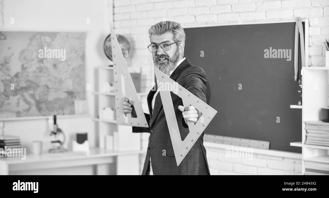 Final examination may be oral written or practical. Teacher explaining theory. College high school. Prepare for test. Teacher bearded man chalkboard Stock Photo