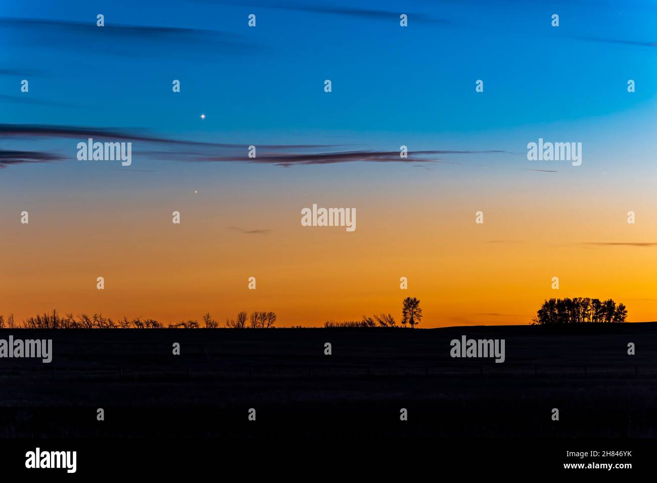 The conjunction of bright Venus (then approaching its greatest elongation from the Sun two weeks later) above dimmer redder Antares in Scorpius on the Stock Photo