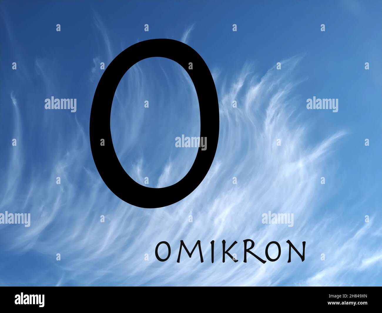 Omikron symbol on cloudy background Stock Photo